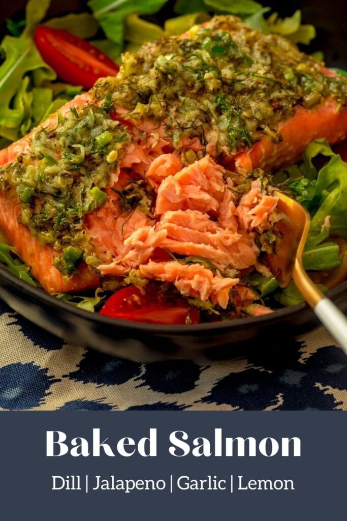 salmon in a bowl with salad and text overlay