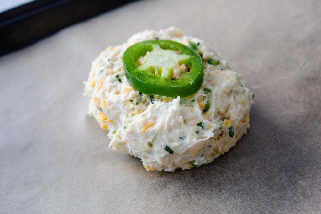 cheddar and jalapeno buttermilk biscuits dough portioned for baking