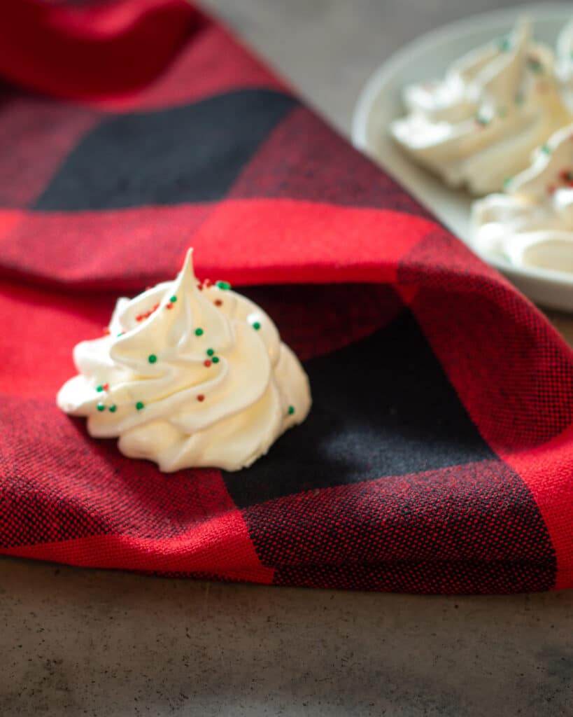 solo meringues on a red and black gingham napkin